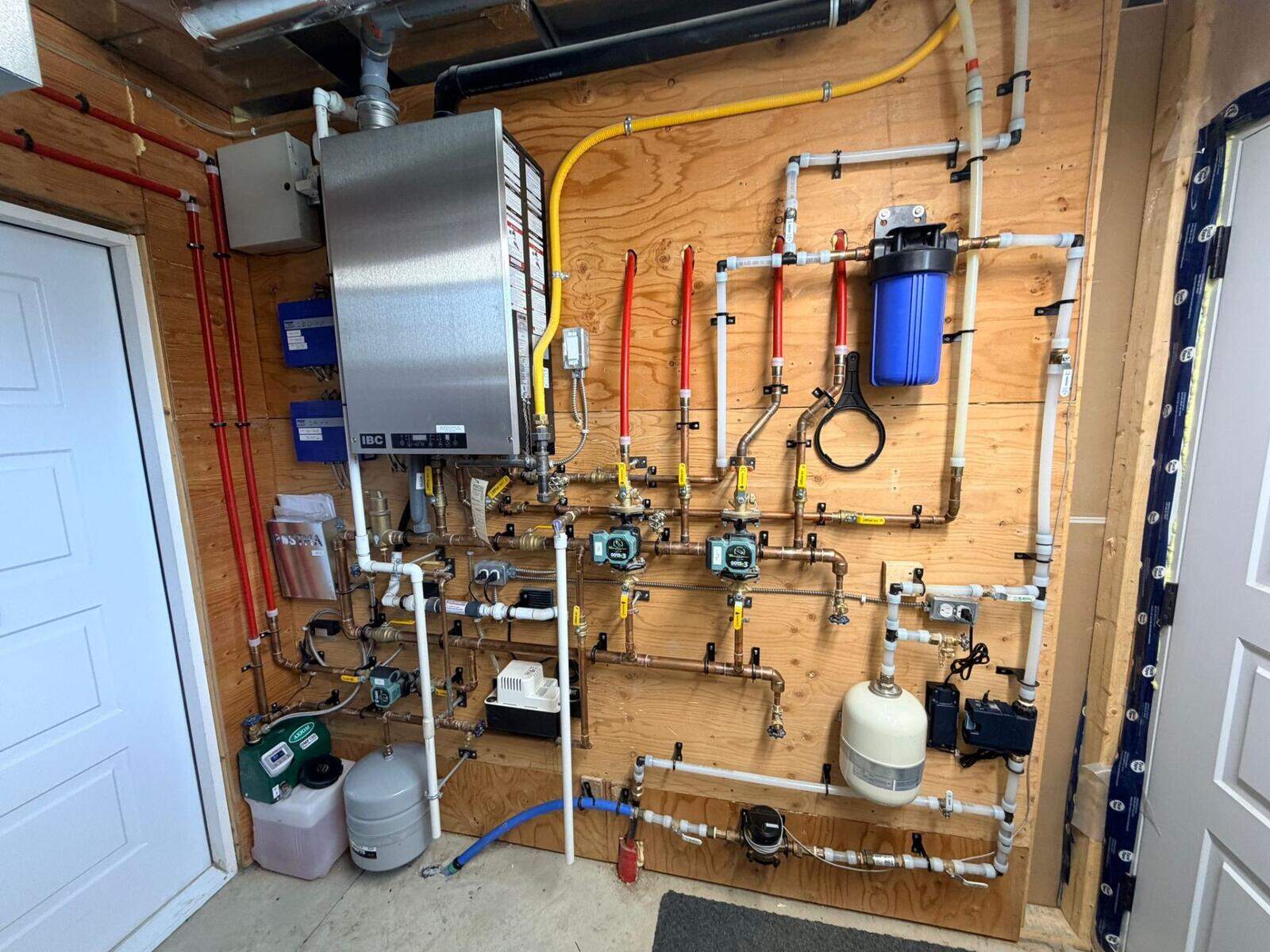 Mechanical Room Design for Barndominiums — IBC Boiler, Radiant Manifold & Water Systems